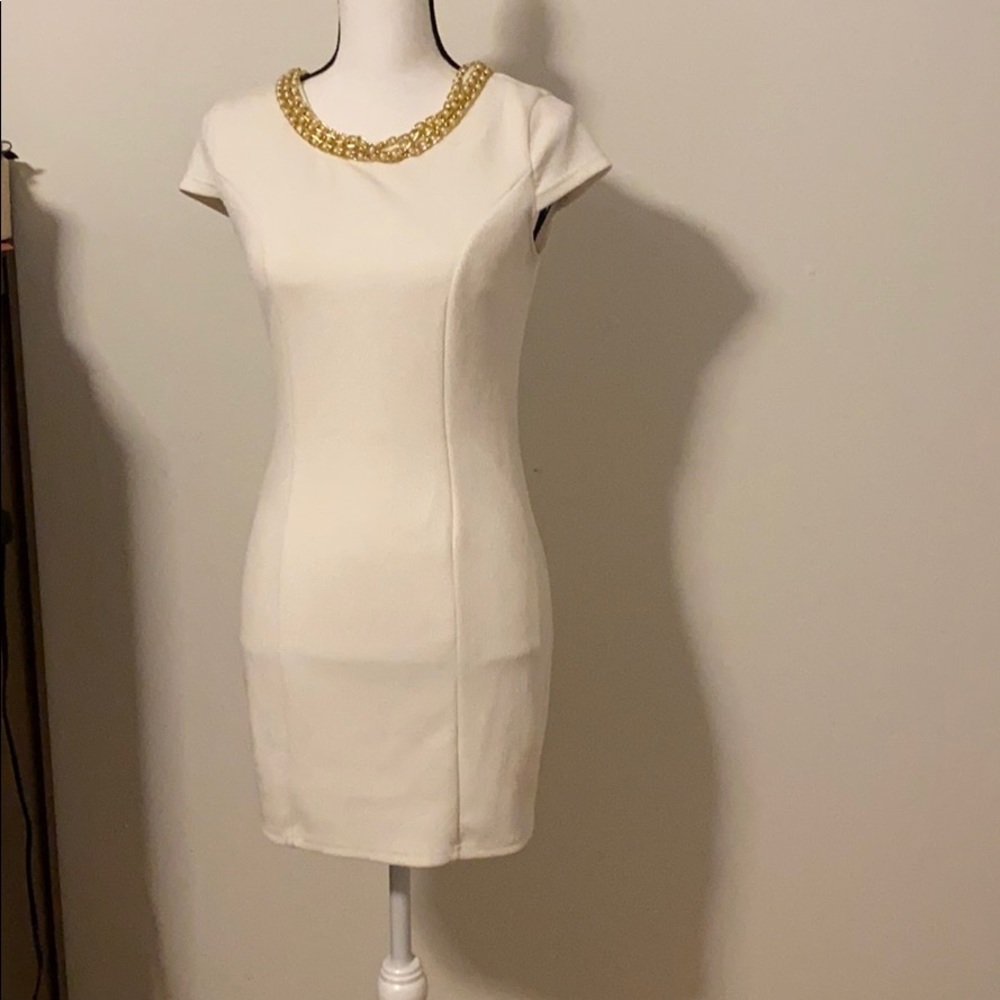 White dress with gold chain